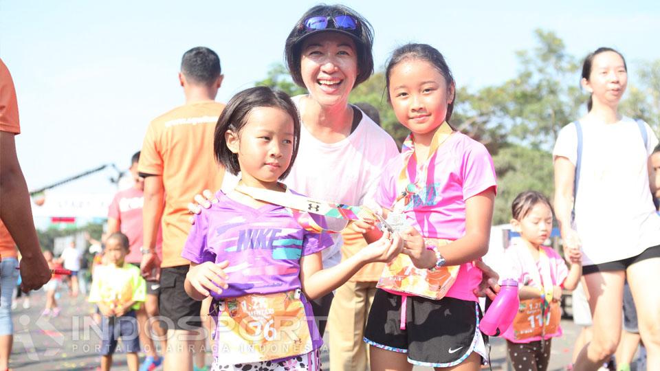 Ibu dan anak juga turut serta dalam lomba Serpong Green Warrior Run 2016.
